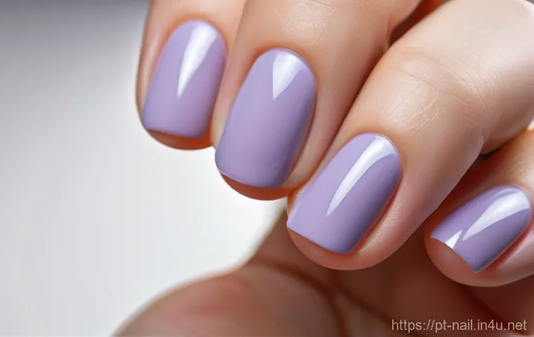 셀프 네일 필수 아이템 - **Prompt 2: Gel Polish Application Under UV Light**
    "A vibrant, eye-level shot capturing the mom...